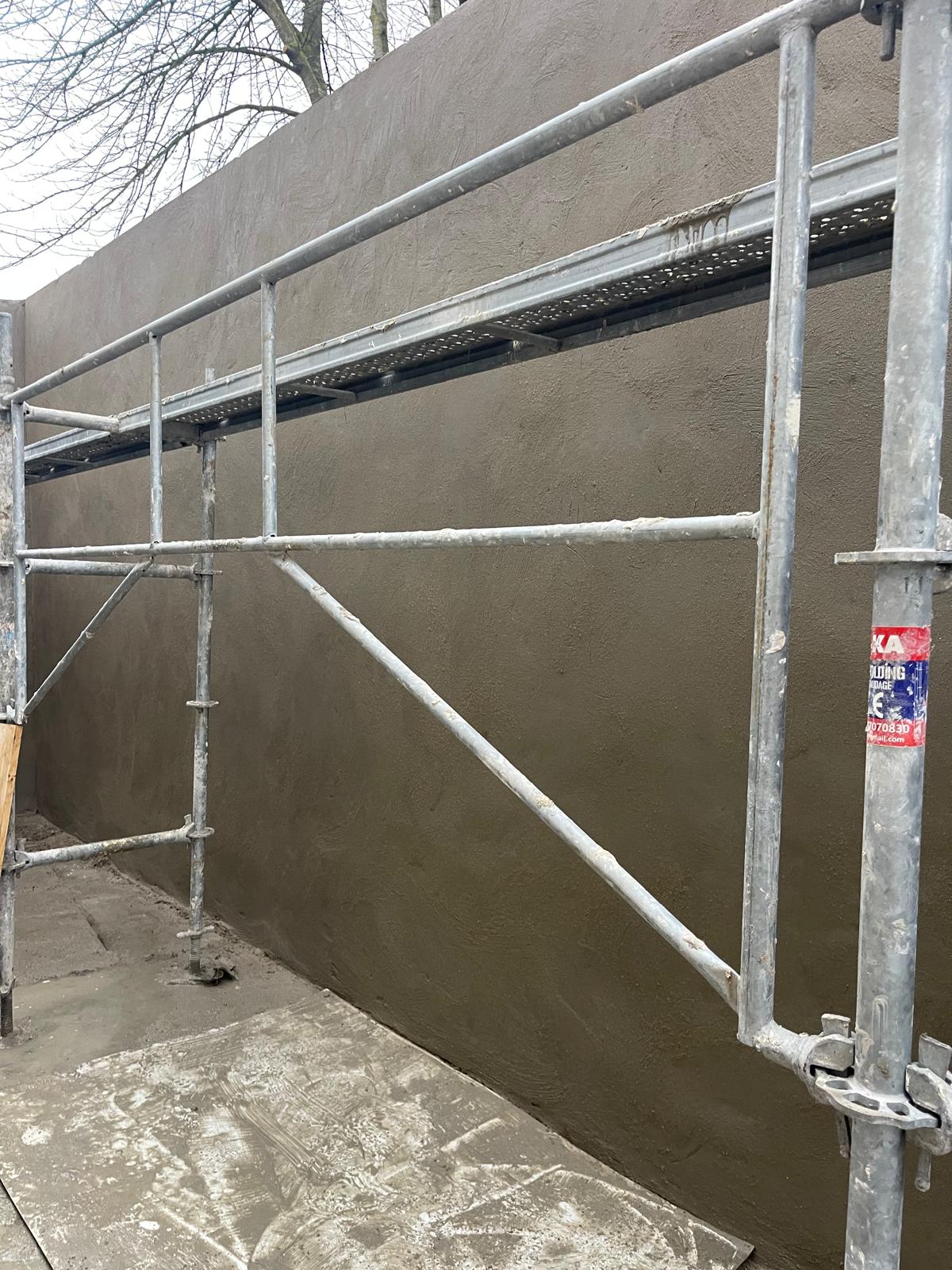 Enduit taloché et lissé